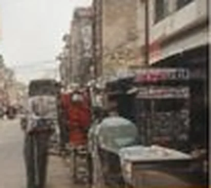 Street vendor carts lining a market road